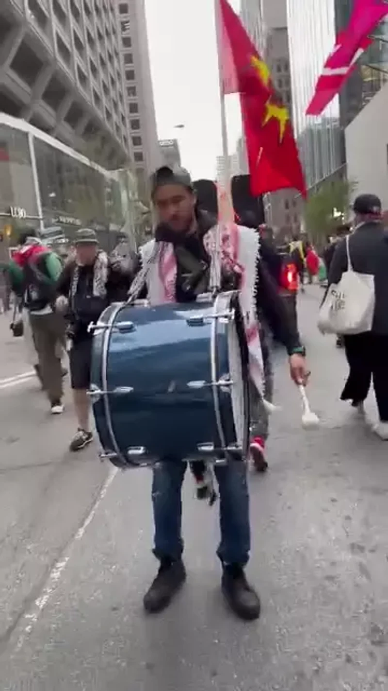 Ahmad Hajahmad Leads March Playing Drum_#33